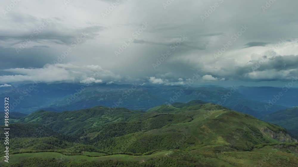 Aerial view of clouds over summer green mountains landscape, Montenegro, panorama 4k Aerial view of clouds over summer green mountains landscape, Montenegro, panorama 4k