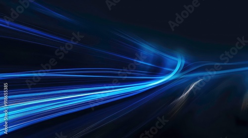 A dark abstract background with streaks of blue light that swirl and curve creating a hypnotic and dynamic effect.