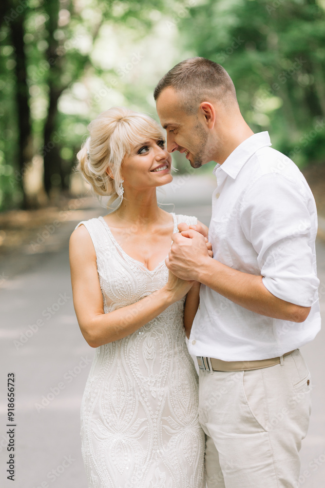Romantic Couple Embracing in Forest Setting During Daylight, Capturing Love and Affection Romantic Couple Embracing in Forest Setting During Daylight, Capturing Love and Affection