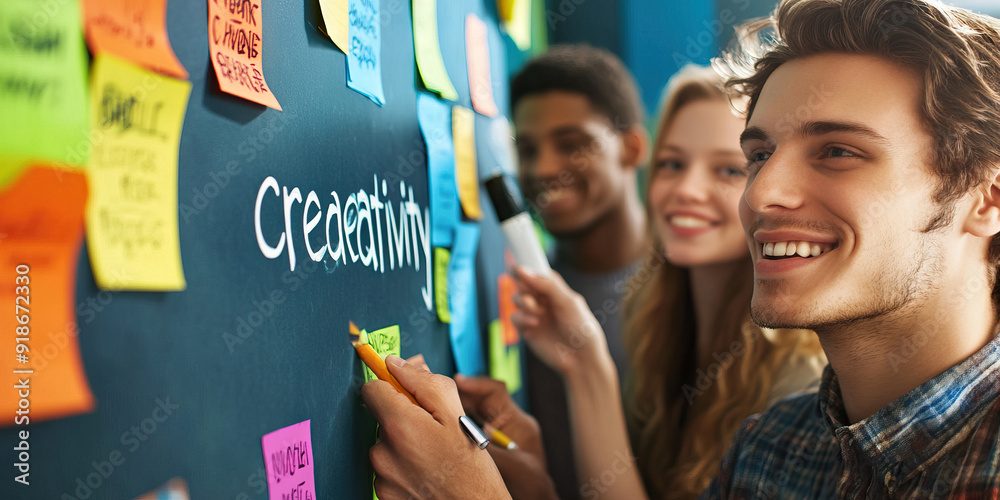 Obraz premium Dynamic Innovation: A team brainstorms around a colorful bulletin board with 