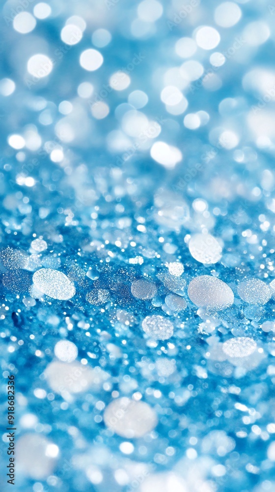 Abstract Blue Glittering Bokeh Background with Defocused Light Effects Abstract Blue Glittering Bokeh Background with Defocused Light Effects