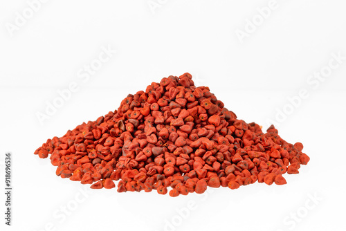 Bixa Orellana - Annatto seeds. Red food coloring and seasoning photo