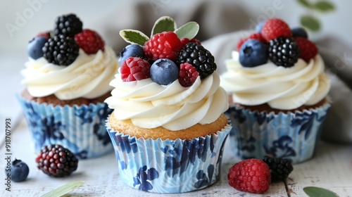Wallpaper Mural Delicious Cupcakes with Creamy Frosting and Fresh Berries on a Wooden Table Torontodigital.ca