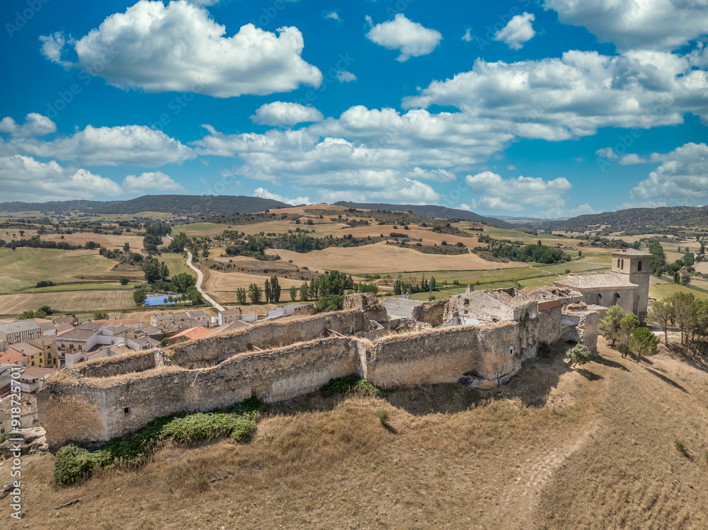 Aerial view of Huerta de la Obispalia in La Mancha Spain, hilltop medieval fortification with pentagonal bastion gun platforms at both ends Aerial view of Huerta de la Obispalia in La Mancha Spain, hilltop medieval fortification with pentagonal bastion gun platforms at both ends