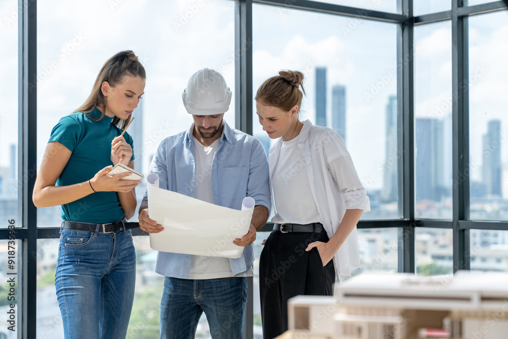 Group of architect engineer looking at project plan while brainstorming idea about building structure. Manager team discuss about building construction while standing near with city view. Tracery.