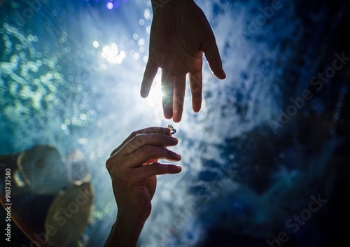 hands with engagement ring 