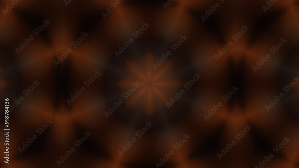A symmetrical design featuring orange shapes radiating from a central point, creating a kaleidoscopic effect. A symmetrical design featuring orange shapes radiating from a central point, creating a kaleidoscopic effect.