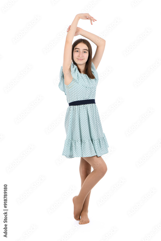 Young beautiful girl in a dress with polka dots on a white background. Young beautiful girl in a dress with polka dots on a white background.