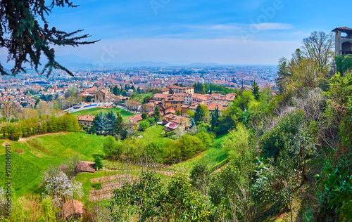 The green park and lower town of Bergamo, Italy