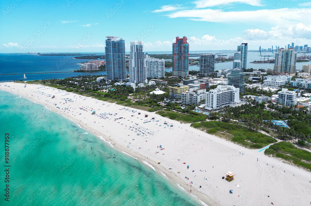 Miami Beach scene from drone, Florida, USA. Miami seaside. Aerial view of Miami Beach and cityscape. Coastline of Miami Beach, aerial view. Famous American landmarks. Summer travel in USA. Miami Beach scene from drone, Florida, USA. Miami seaside. Aerial view of Miami Beach and cityscape. Coastline of Miami Beach, aerial view. Famous American landmarks. Summer travel in USA.