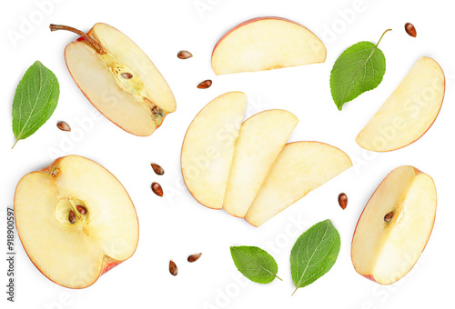sliced apple and leaves of an apple tree on a white isolated background