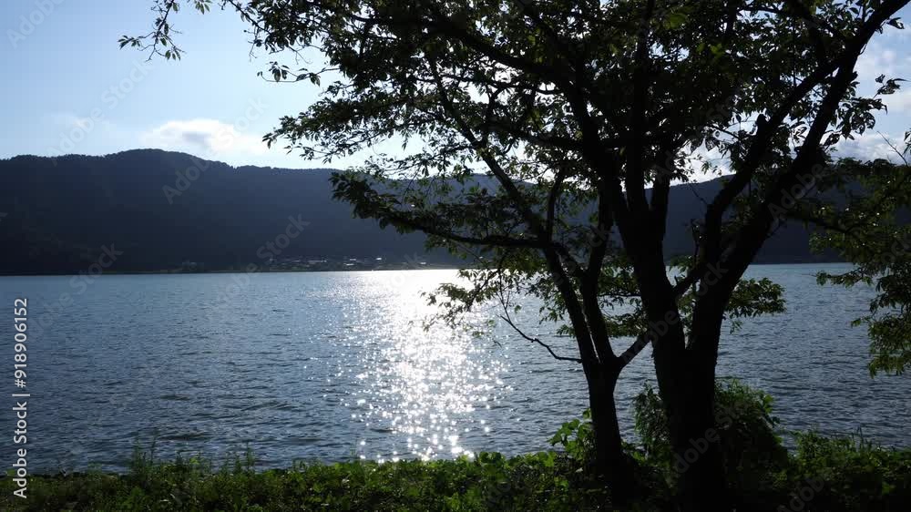 Beautiful view of the light reflecting off the lake surface. Beautiful view of the light reflecting off the lake surface.