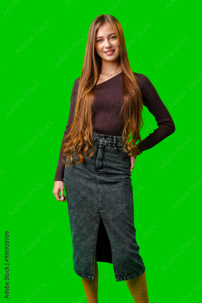 Young Woman Wearing Brown Top and Denim Skirt Posing on Green Screen Young Woman Wearing Brown Top and Denim Skirt Posing on Green Screen
