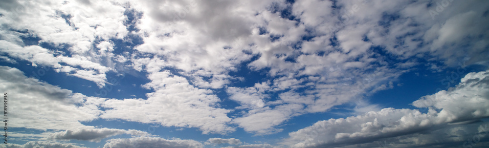Blue sky cloud gradient background. Cloudy sky. Vivid cyan blue landscape in environment day horizon skyline view. White clouds on soft sky background. White cloudy sky. Blue sky cloud gradient background. Cloudy sky. Vivid cyan blue landscape in environment day horizon skyline view. White clouds on soft sky background. White cloudy sky.