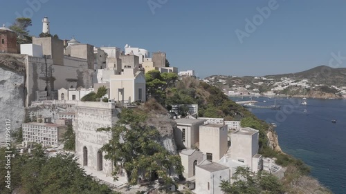 Il caratteristico cimitero dell'Isola di Ponza a strapiombo sul mare. Italia, Mediterraneo. 
Ripresa Aerea con drone dei loculi e delle cappelle cimiteriali di Ponza. DLog. No Color