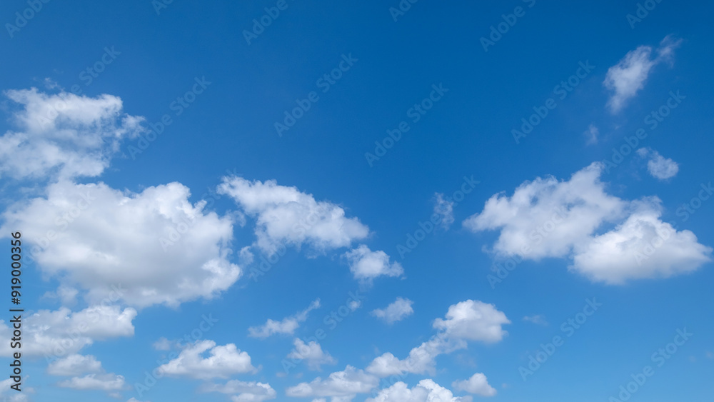 clear blue sky background,clouds with background, Blue sky background with tiny clouds. White fluffy clouds in the blue sky. clear blue sky background,clouds with background, Blue sky background with tiny clouds. White fluffy clouds in the blue sky.