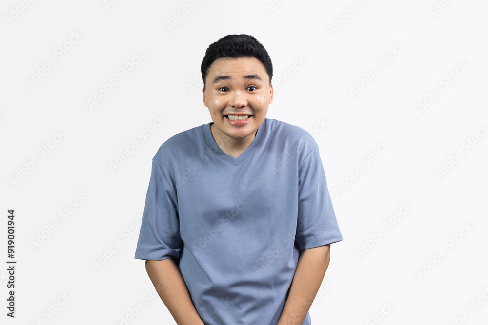 Portrait of man smile with blue shirt against white background Portrait of man smile with blue shirt against white background