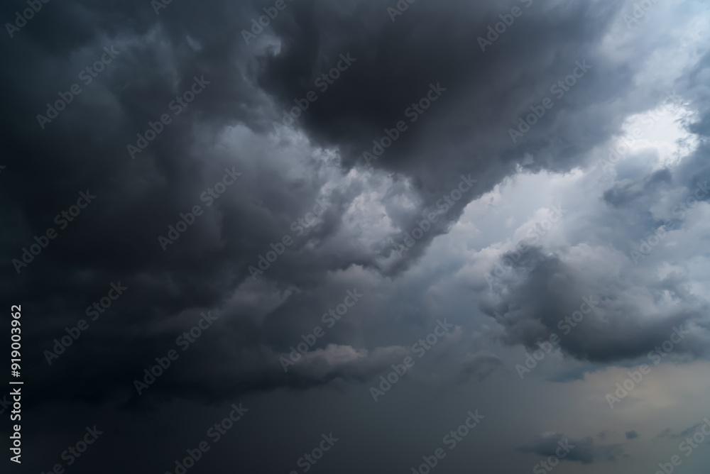 Obraz premium Dark sky with stormy clouds. Dramatic sky rain,Dark clouds before a thunder-storm.