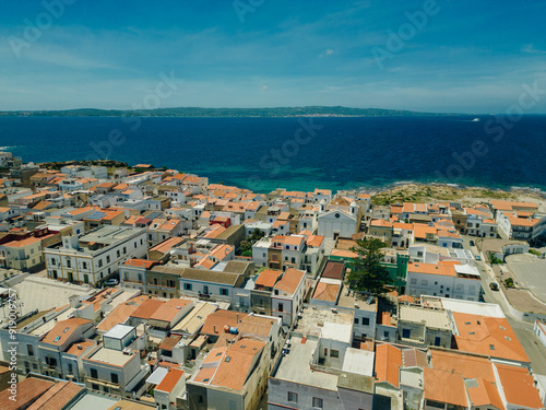 Aerial view of little town of Sant'Antioco houses at sunrise in italy photo