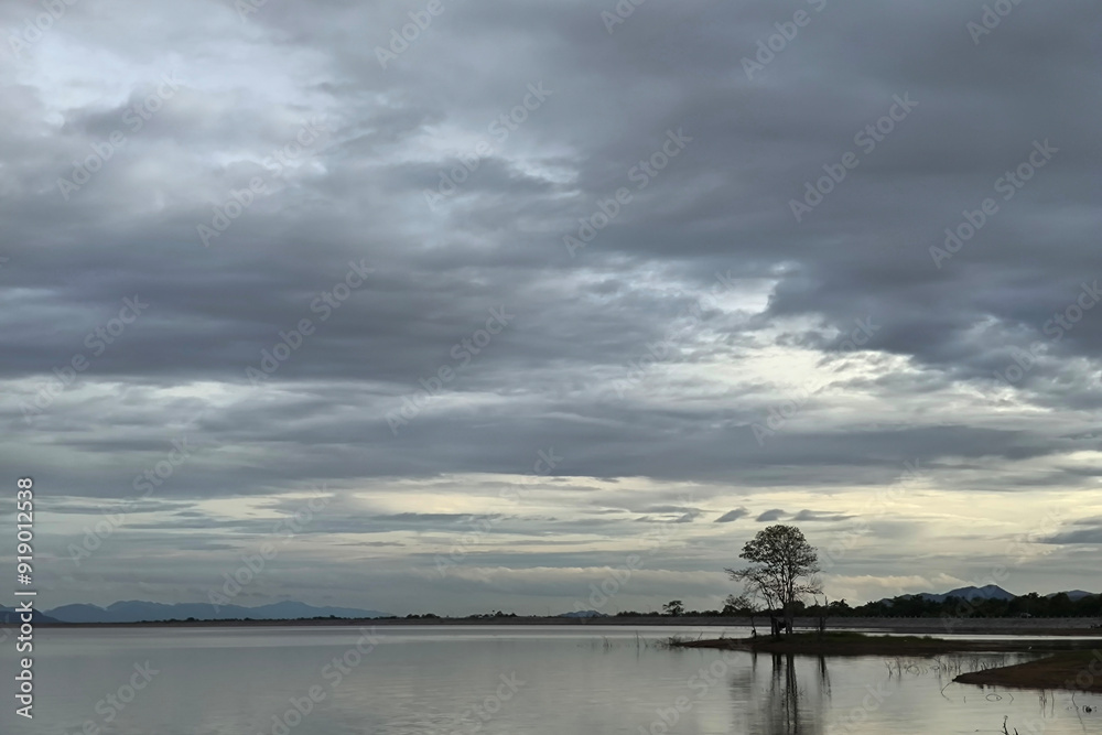 Dramatic sky battles dark water as angry clouds unleash nature's fury Dramatic sky battles dark water as angry clouds unleash nature's fury