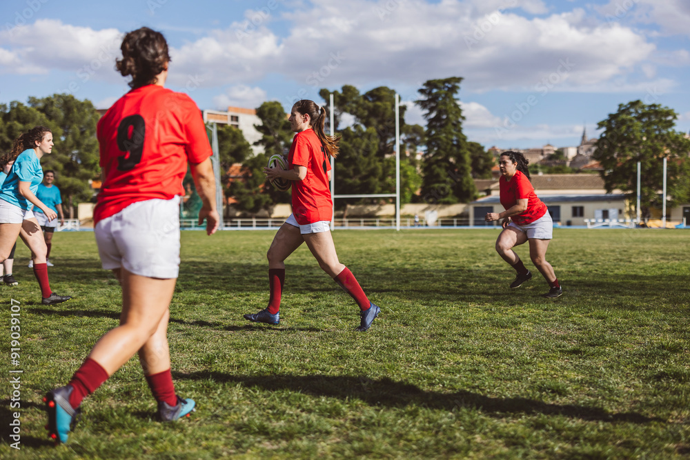 Athletes playing rugby match on sports field Athletes playing rugby match on sports field