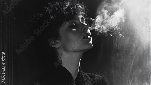 Dramatic portrait of woman exhaling smoke in moody lighting Atmospheric black and white image for artistic projects film noir aesthetics and cinematic storytelling