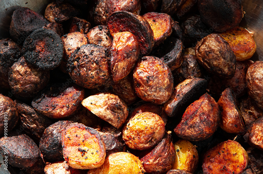 potatoes fried with a crust in a pan. appetizing ruddy baked potatoes
potatoes fried with a crust in a pan. appetizing ruddy baked potatoes