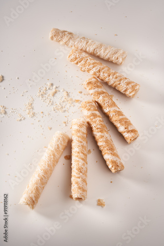 Crispy and delicious coconut crispy egg roll snack close up on white background