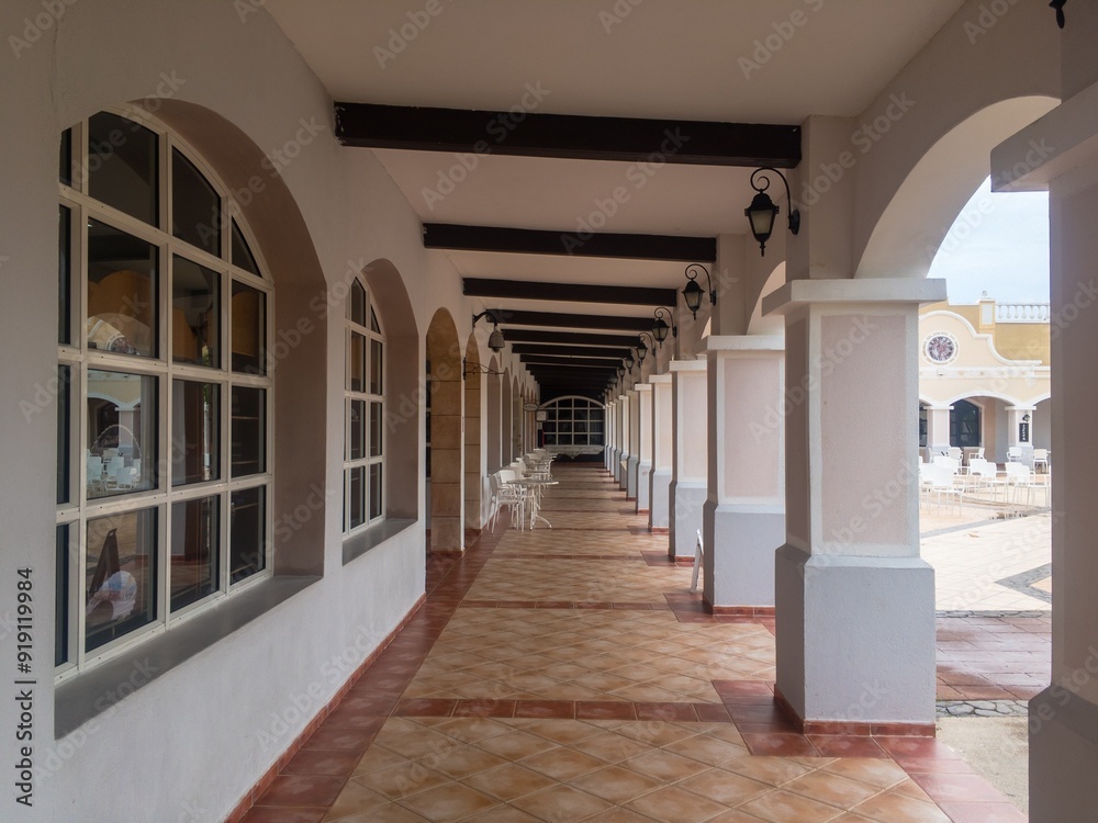 Archway in colonial Spanish style in holiday resort, generic hotel
