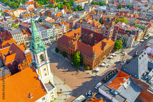 Obraz na płótnie Aerial panoramic view of historical buildings and roofs in Polish medieval town Torun w salonie