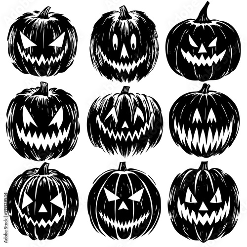 A collection of black and white pumpkins featuring scary faces on them