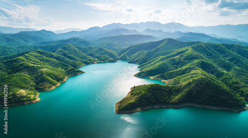 "Aerial view of stunning natural scenery, featuring majestic mountains and serene bodies of water, showcasing the beauty of the landscape."