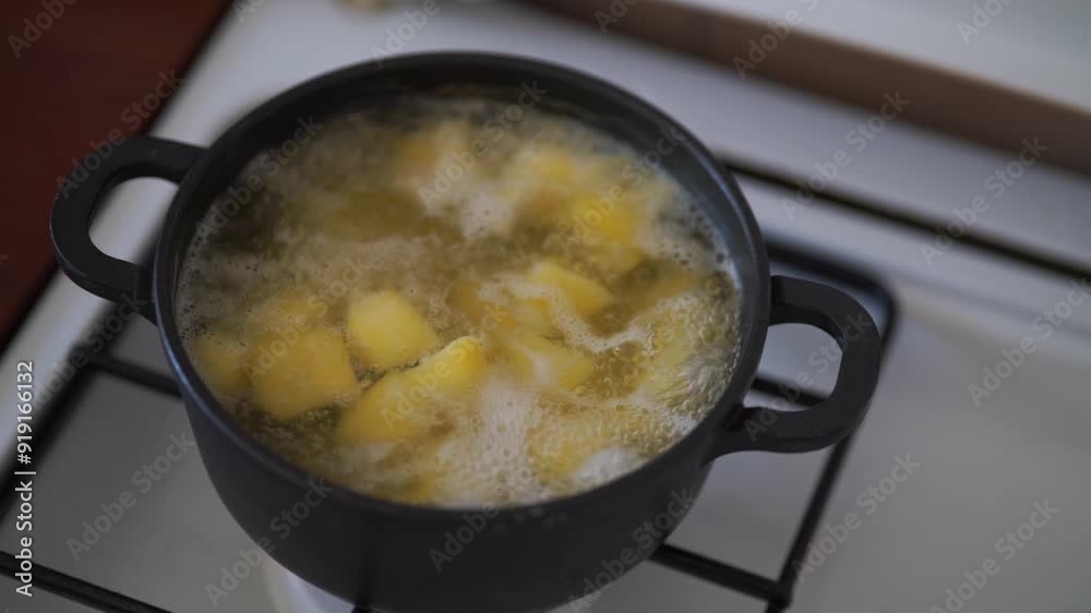 cooking boiling potatoes in the kitchen cooking boiling potatoes in the kitchen