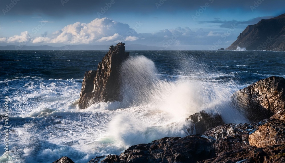 Fototapeta premium Stormy ocean waves crashing against rocks