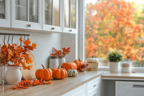 modern kitchen with autumn decorations 