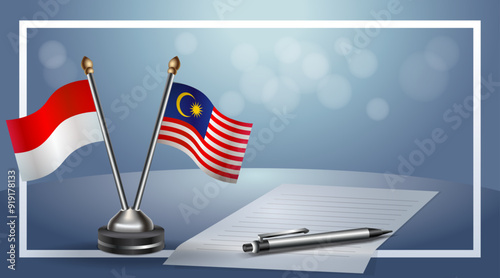 Indonesia and Malaysia Small national flag on bokeh background, cooperative relationship