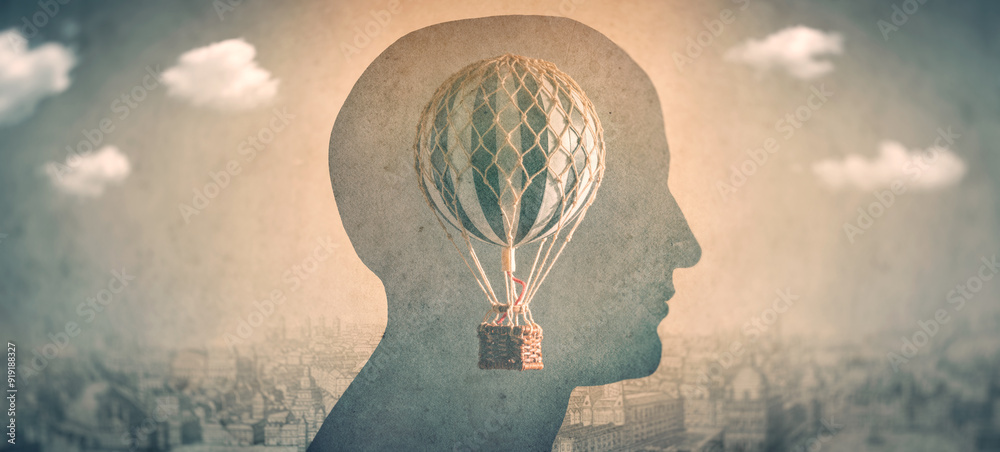 Silhouette of a man with a balloon, an aerostat as a symbol of freedom of thought. Concept , idea on the theme of psychiatry, psychology, religion, science, social phenomen. Silhouette of a man with a balloon, an aerostat as a symbol of freedom of thought. Concept , idea on the theme of psychiatry, psychology, religion, science, social phenomen.