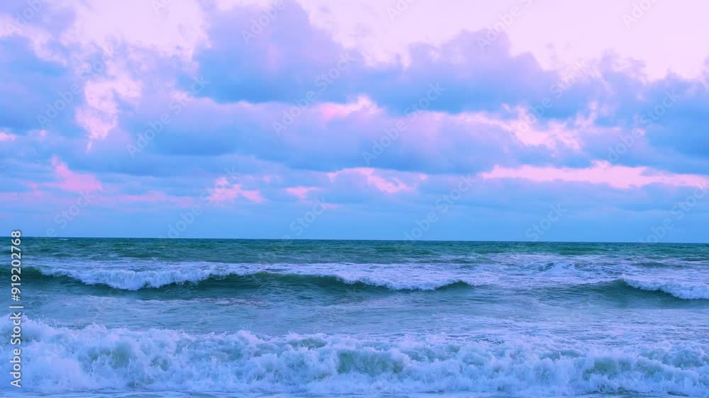 Long Foaming Waves in Sea Rolling on Shore and Beautiful Dramatic Sky Tropical Sunset Colorful Cumulus Clouds, Horizon, Planet, Travel, Ocean, Colored Sky, Puffy Clouds. Long Foaming Waves in Sea Rolling on Shore and Beautiful Dramatic Sky Tropical Sunset Colorful Cumulus Clouds, Horizon, Planet, Travel, Ocean, Colored Sky, Puffy Clouds.