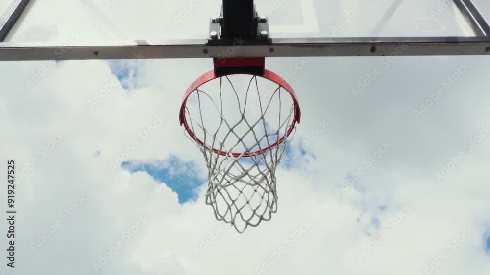 the basketball flies into the basket the basketball flies into the basket