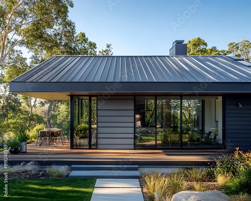 New suburban house with a photovoltaic system on the roof. panel, eco, electricity, environmental, photovoltaic, power, renewable, residential, roof, system, ecology, energy, sunlight, home photo