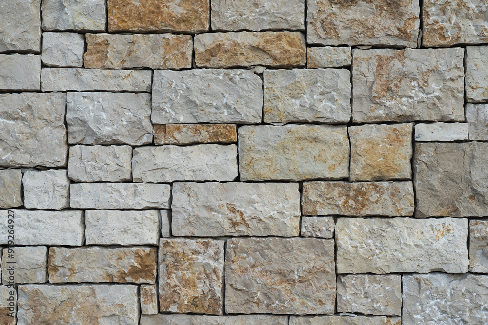 Photo texture of a wall made of stones hewn to look like brick. Photo texture of a wall made of stones hewn to look like brick.