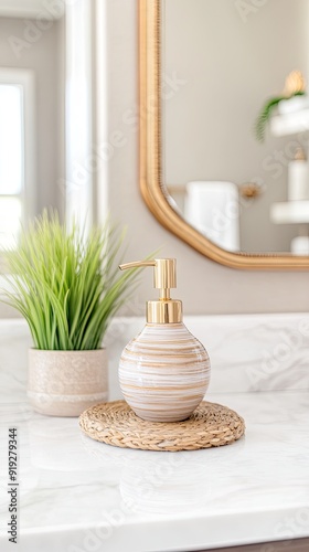 A close-up view features a marble effect soap pump alongside white towels and a plant in a modern marble-tiled bathroom