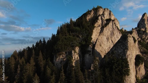 FPV drone footage of the spectacular rock formations at Pietrele Doamnei in Rarau, Romania, showcasing stunning natural beauty and rugged landscapes, perfect for nature and adventure projects. photo