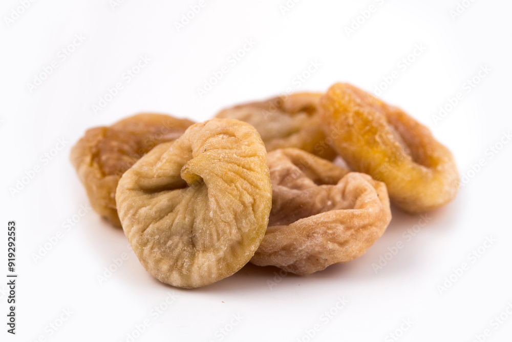 Dried figs on a white background. Dried fruit. Dried figs on a white background. Dried fruit.
