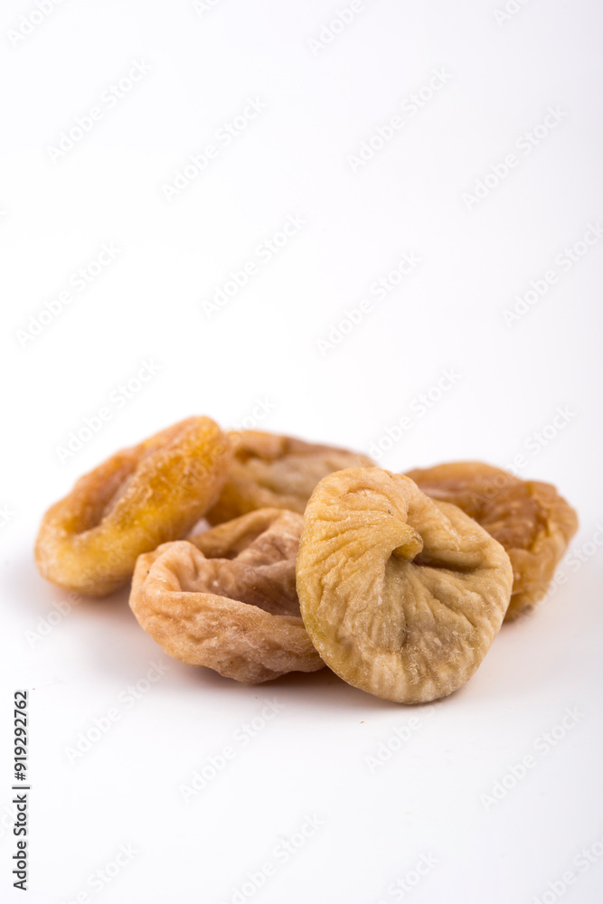 Dried figs on a white background. Dried fruit. Dried figs on a white background. Dried fruit.
