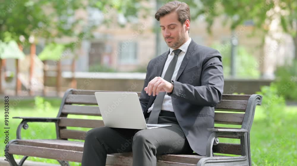 Middle Aged Businessman with Laptop Looking at Camera in Denial Outdoor Middle Aged Businessman with Laptop Looking at Camera in Denial Outdoor