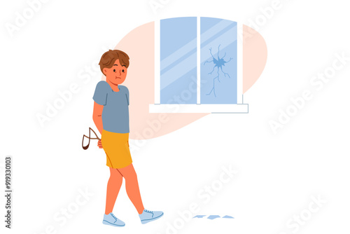 Hooligan boy broke window with slingshot and is afraid of punishment from parents for bad behavior. Hooligan child does pranks due to lack of upbringing or desire to attract attention.