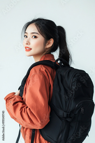 Beautiful young women with backpacks, students, college students go to school and back to school. Travelers, backpackers