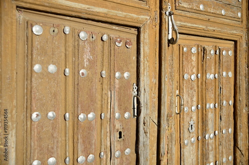 Old wooden door with knocker