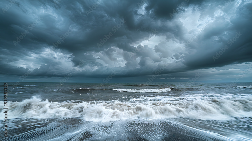 A dramatic storm rolling in over the Atlantic, with dark clouds gathering and powerful waves crashing against the shore. A dramatic storm rolling in over the Atlantic, with dark clouds gathering and powerful waves crashing against the shore.